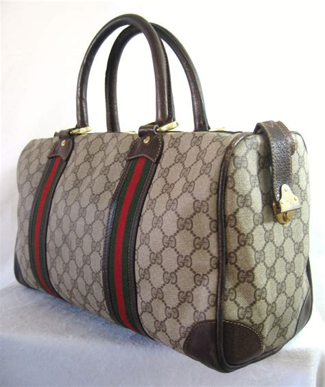 real gucci duffle bag|gucci duffle bag used.